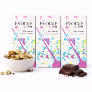 Three-pack of Evolve Fungi 55% cacao mushroom chocolate bars on white marble background